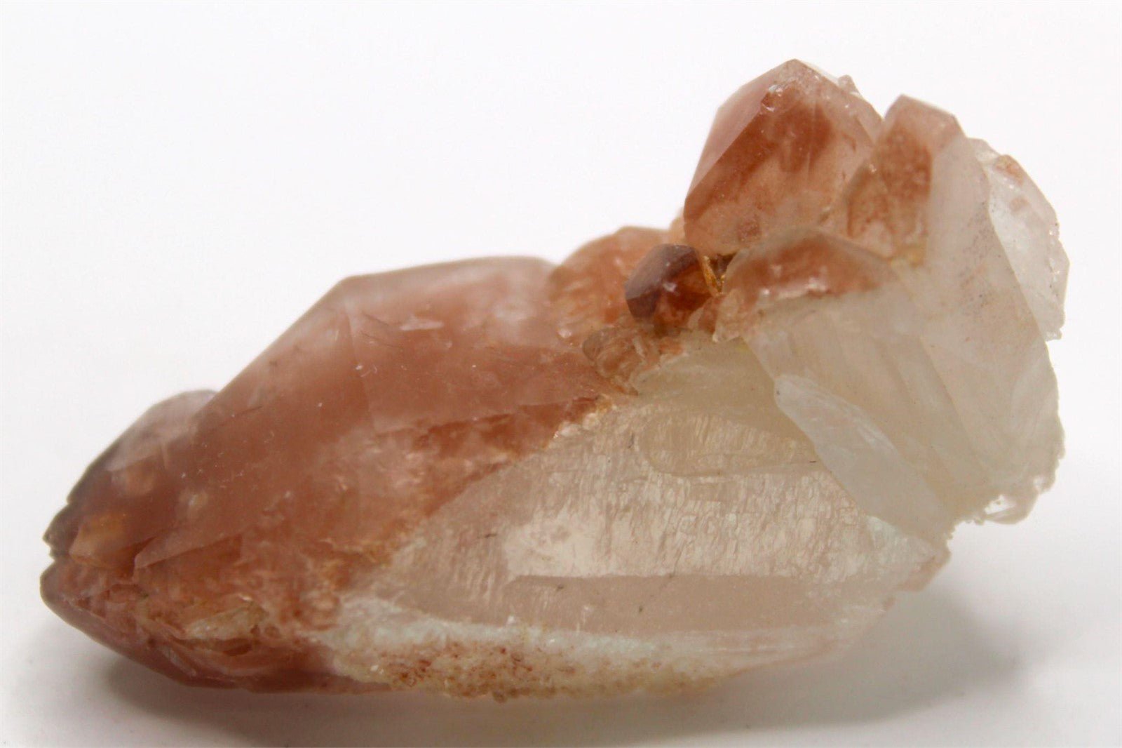 Pink Lithium Crystal Cluster from Brazil Approx. 3.5 cm x 3.5 cm Pink lithium quartz crystals get their pink color from lepidolite, a lithium-rich mica mineral.